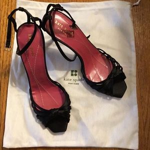 Black Kate Spade strappy heels.